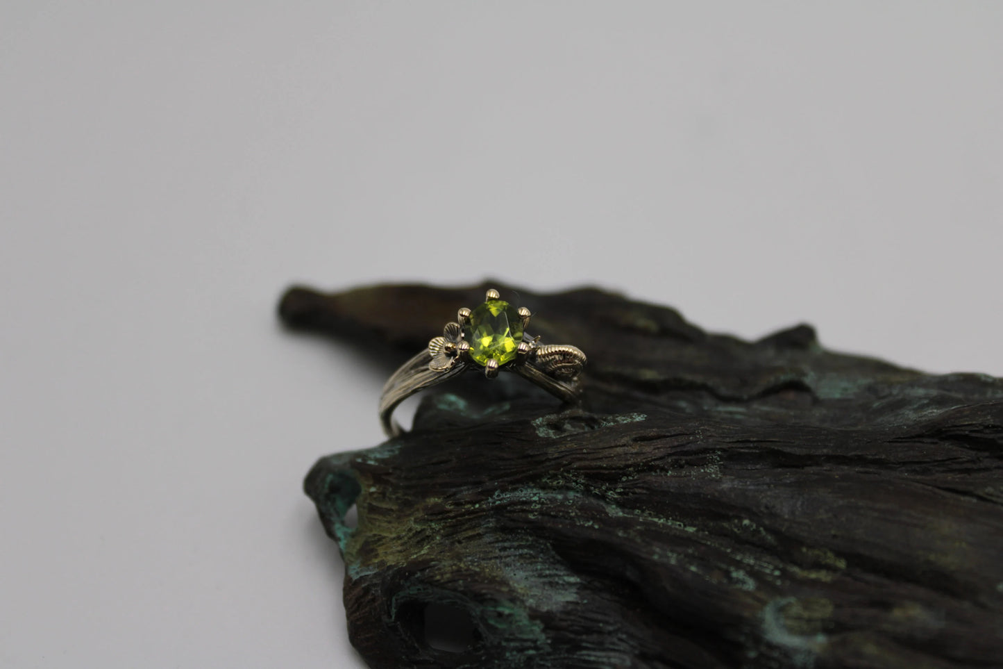 Petals and Shells - Peridot Gold Snail Engagement Ring