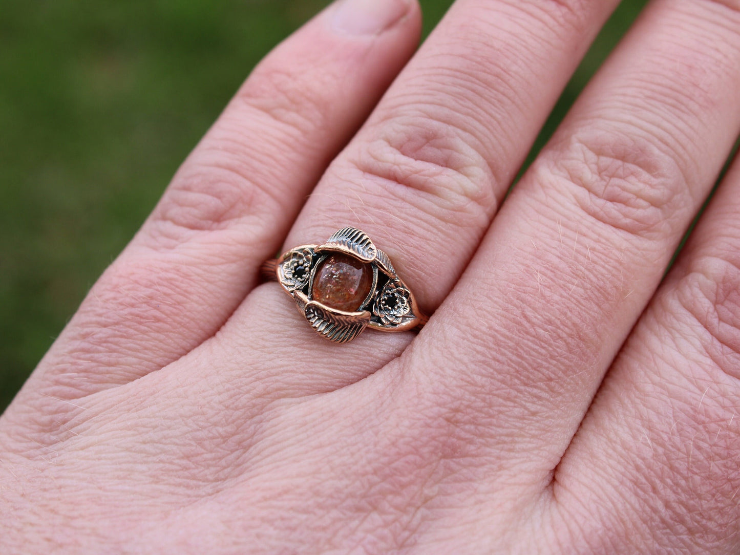 Lotus Leaf Dance - Sunstone Gold Lotus Engagement Ring