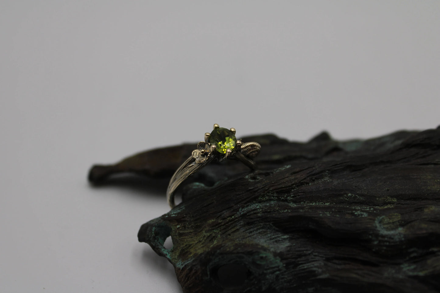 Petals and Shells - Peridot Gold Snail Engagement Ring